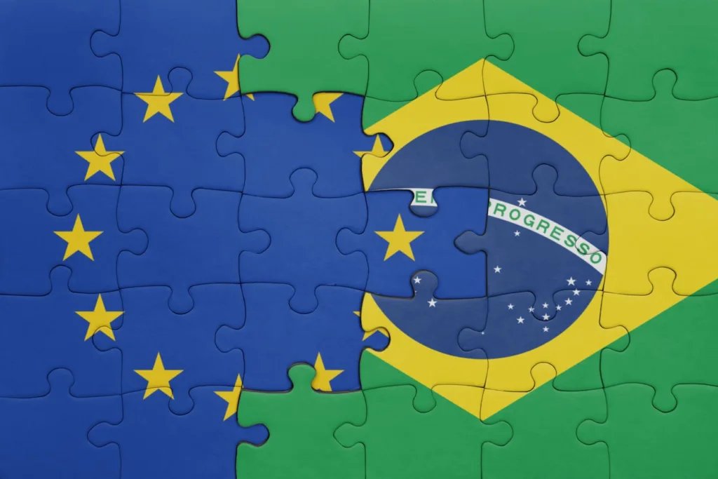 puzzle with the colourful national flag of brazil and flag of european union. concept